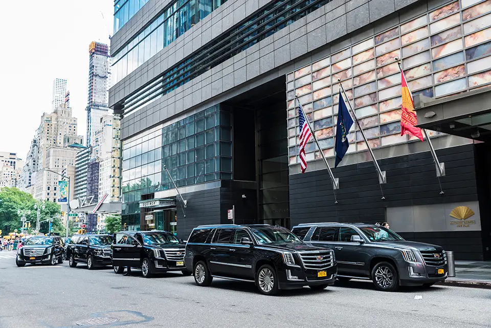 Chauffeur at Mandarin Oriental New York Hotel exterior in New York City, USA.